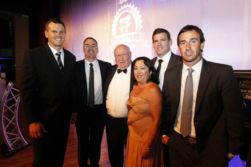 The Knights' original Hall of Fame inductees, Paul Harragon, Michael Hagan, Matt Gidley, Andrew Johns and the late Allan McMahon, represented by Glenys McMahon, and Allan Bell. Picture by Peter Stoop