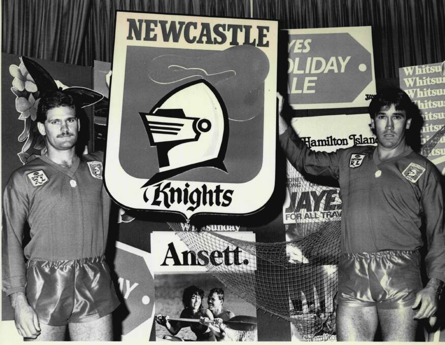LAUNCH: Players John Crooks and Peter Walsh model the new Knights jerseys and the club's logo.