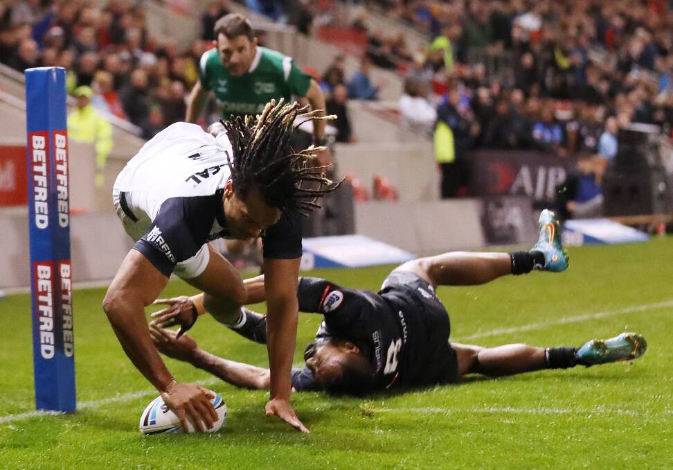 Dominic Young scores against Fiji. Picture Getty Images