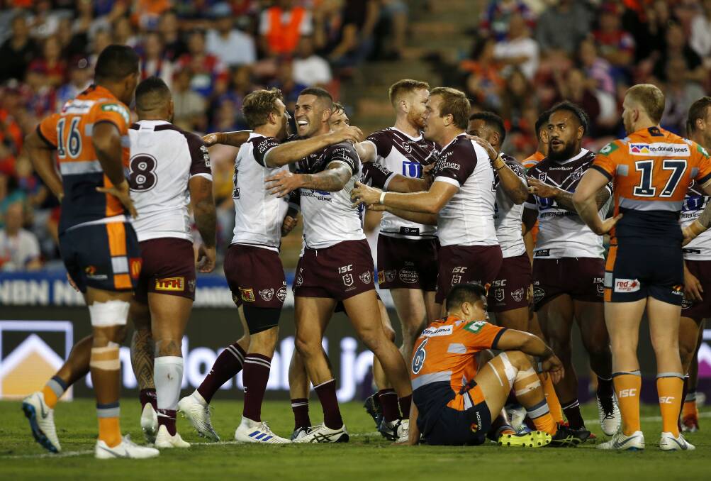 REALITY CHECK: Manly celebrate one of their three early tries in last week's win against the Newcastle Knights. Picture: Darren Pateman, AAP