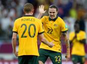 ROO BEAUTY: Jackson Irvine and Kye Rowles celebrate the do-or-die win against UAE. Picture: Getty Images