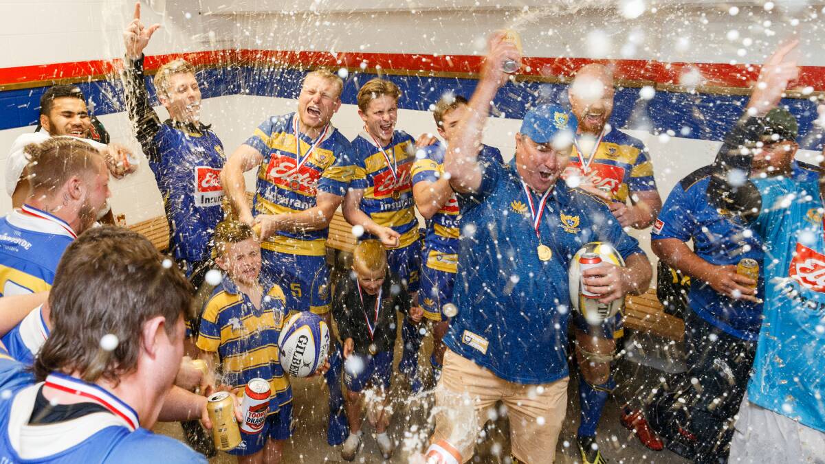 PARTY TIME: Hamilton celebrate after overpowering Wanderers 36-7 in the grand final to win their fifth straight premiership. Picture: Max Mason-Hubers