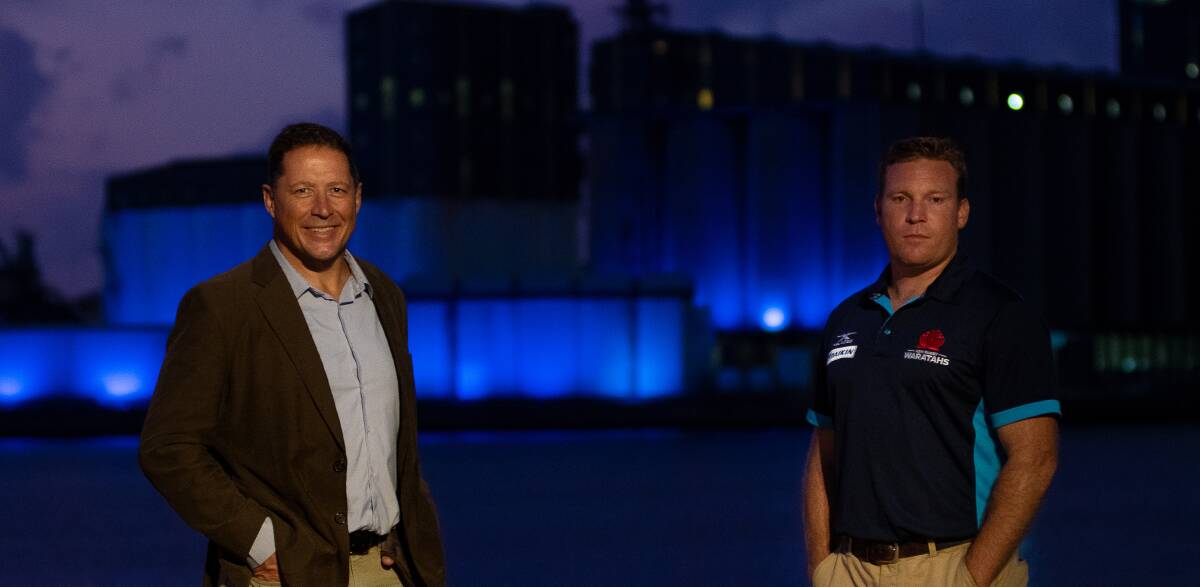 BLUES: Former Wallaby captain Phil Kearns and former NSW waratahs halfback and current manager of rugby Tim Rapp in front of the blue silos. Picture: Simon McCarthy