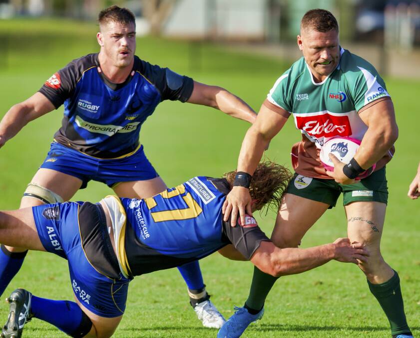 ON HOLD: Billy Coffey hits the ball up against the Western Force. The Newcastle representative program has been stalled the competition start put back until at least May. Picture: Stewart Hazell 