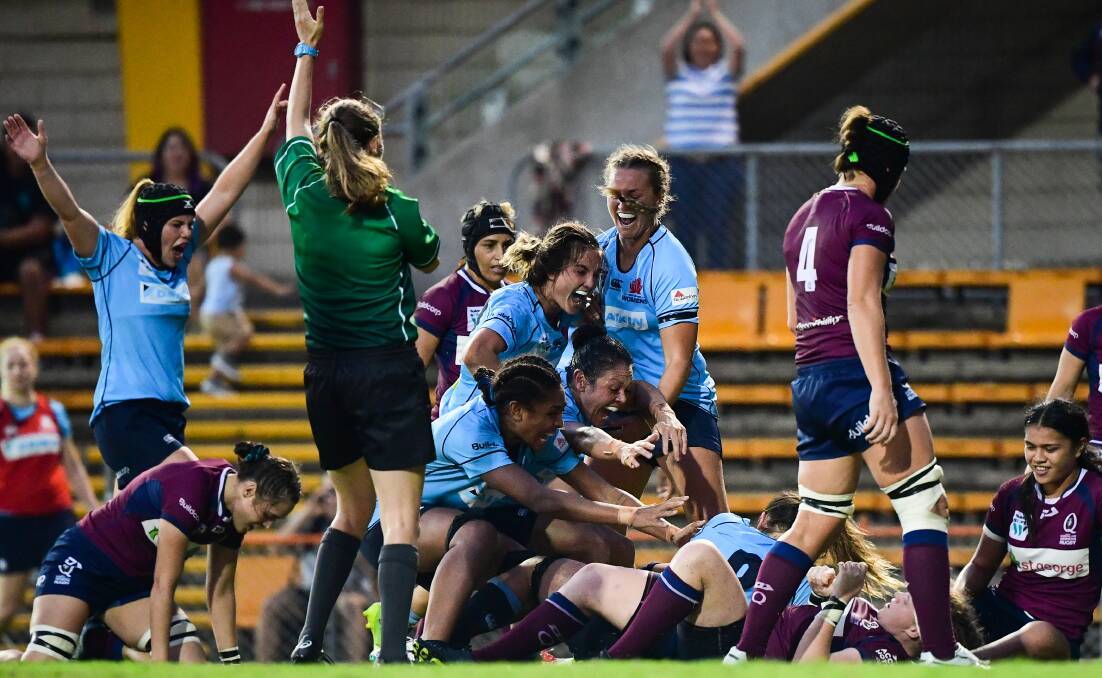 PARTY TIME: Katrina Barker celebrates after a NSW try in the Super W final against Queensland. 