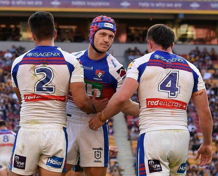 Disappointed: Knights captain Kalyn Ponga with Enari Tuala and Bradman Best after the side's season-ending loss to Parramatta in Rockhampton. Picture: Getty Images