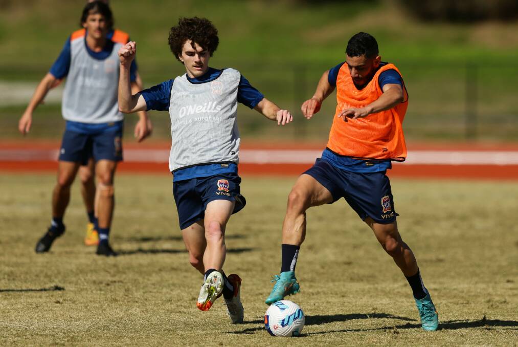 ON THE BALL: Mark Natta challenges Mo Al-Taay for the ball at Jets training. Picture: Jonathan Carroll