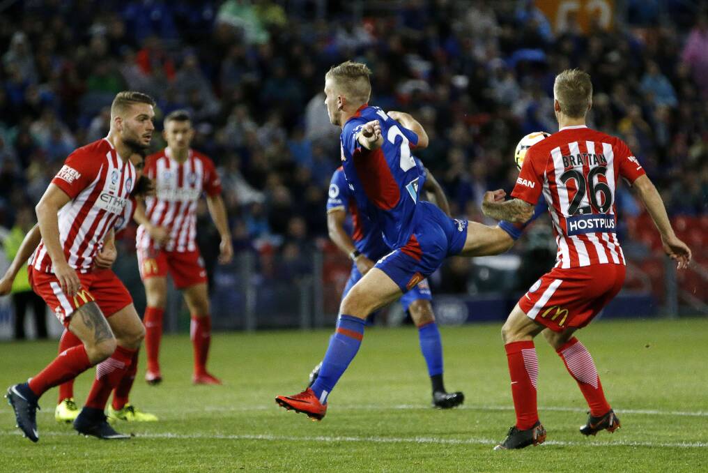 MAGIC MOMENT: Riley McGree's scorpion kick against Melbourne City helps speark the Jets to victory and earned world-wide acclaim. Picture: Darren Pateman (AAP)