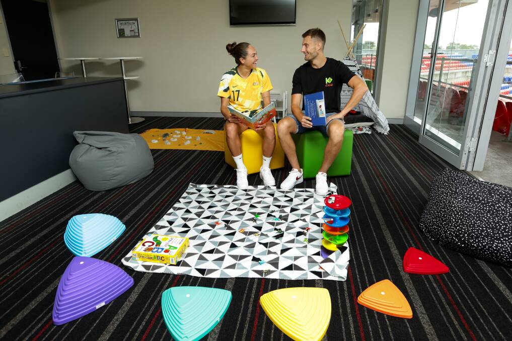 HAVEN: Matildas midfielder Kyah Simon and Jets striker Kaine Sheppard in the "sensory room" that will be in operation for children on the autism spectrum at the game against Vietnam on Friday night. Picture: Jonathan Carroll
