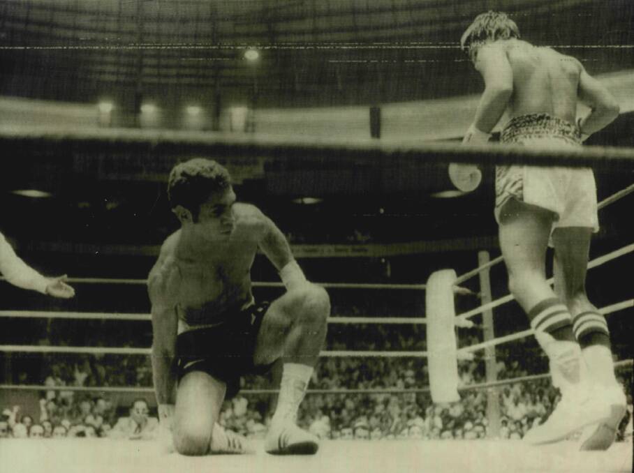 DOWN, NOT OUT: Australian lightweight Hector Thompson gets back to his feet after being knocked down in the 3rd round by WBA Champion Roberto "Rocky" Duran, who beat Thompson with an 8th round TKO. June 3, 1976. Picture: UPI