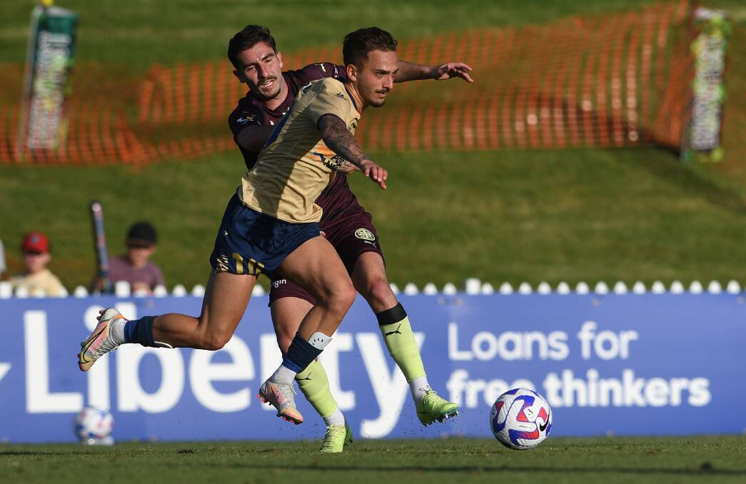 Jets midfielder Reno Piscopo burns off a Melbourne City defender during the 1-all draw in Tamworth. Picture by Gareth Gardner
