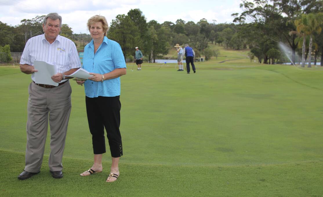 DEVASTATED: Morisset Country Club president Erica Ford with then CEO Ian Taylor in 2013. Picture: David Stewart