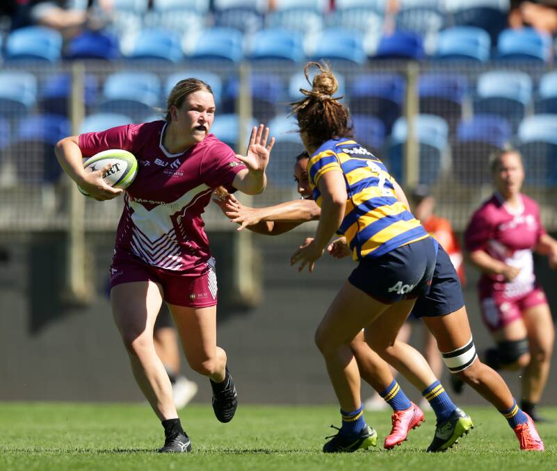 POTENTIAL: Kaitlan Leaney hits the ball up against Sydney University. Picture: Jonathan Carroll