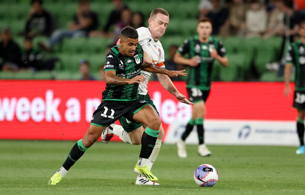 Western United midfielder Daniel Penha battles Newcastle captain Brandon O'Neil for possession in the Jets' 2-0 loss at AAMI Park on Friday night. Picture Getty Images 