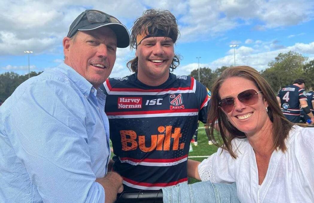 FAMILY AFFAIR: Hunter Wildfires president Brett Sutherlan, son Byron and wife Kirsty. Picture: Facebook