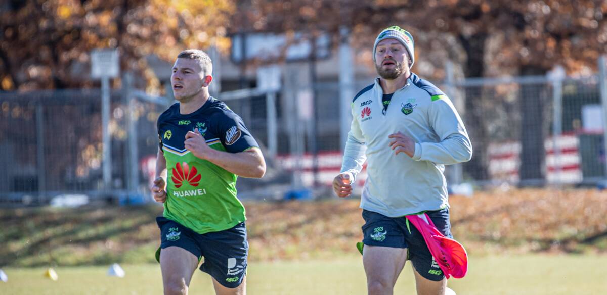 GUARDED: George Williams, left, and Elliott Whitehead say the Raiders aren't getting carried away ahead of the clash against the Knights at Campbelltown on Sunday. Picture: Karleen Minney