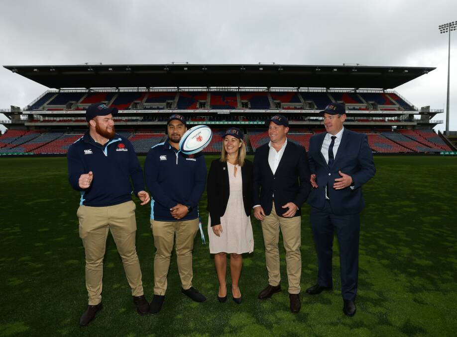 TEAMWORK: NSW Waratahs Harry Johnson-Holmes and Andrew Tuala, Councillor Peter Winney-Baarttz, NSW general manager of Rugby Tim Rapp and Venues NSW CEO Paul Doorn. Picture: Jonathan Carroll
