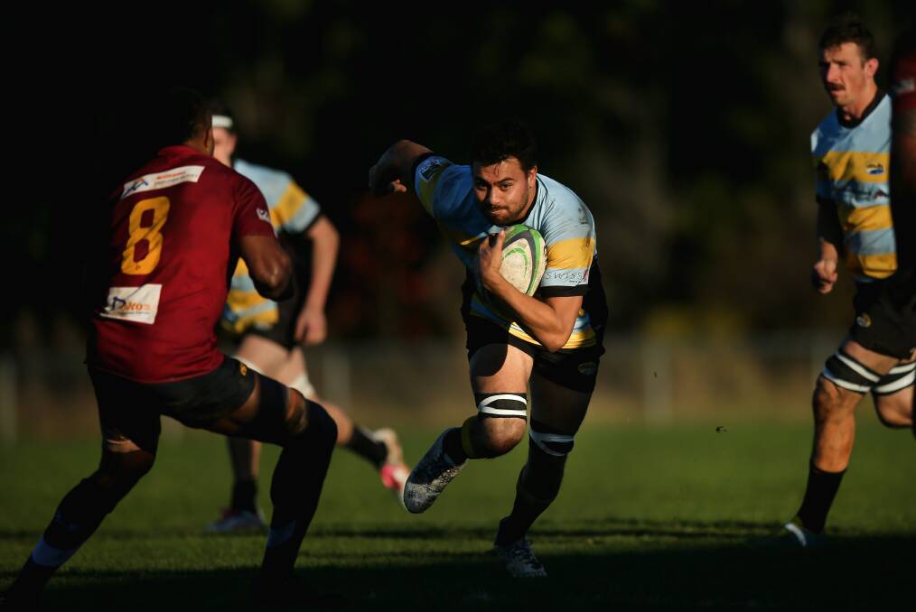 ON THE CHARGE: Southern Beaches back-rower Frank Roberts runs into a hole during the 62-19 triumph over Lake Macquarie at Ernie Calland Field on Saturday. Picture: Marina Neil