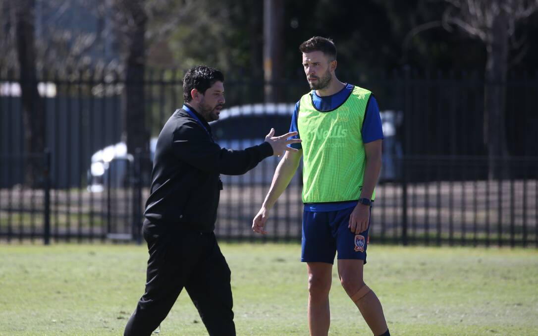 CHANCE: Jets coach Arthur Papas and captain Matt Jurman. Hurman hopes to return from a ankle injury against Melbourne City on Friday. Picture: Simone De Peak