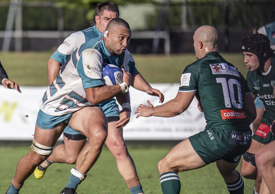 ON THE CHARGE: Barnstorming back-rower Olajuwon Noah carts the ball up for the Hunter Wildfires against Randwick at No.2 Sportsground. Picture: Stewart Hazell