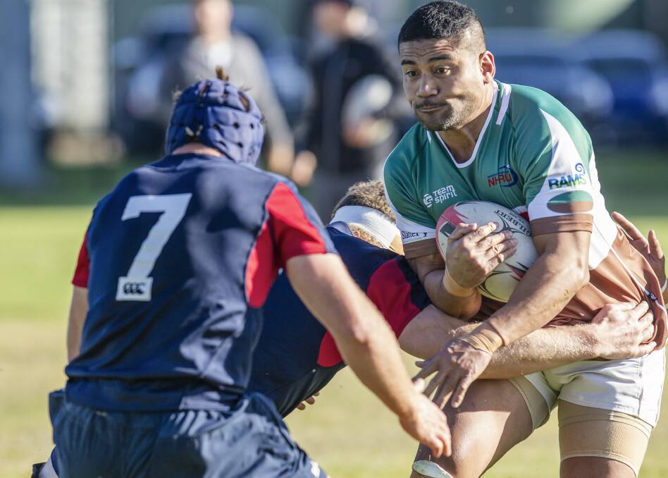 ON THE CHARGE: Marlon Solofuti hits the ball up in the Newcastle Wildfires' internal hit out. They tackle Penrith in a final trial on Saturday. Picture: Stewart Hazell