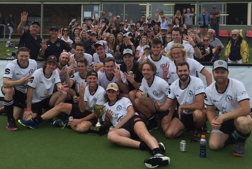AWESOME FOURSOME: Gosford celebrate after beating Norths 2-0 in the grand final on Sunday to win a record fourth straight Hunter Coast Premier Hockey League premiership. 