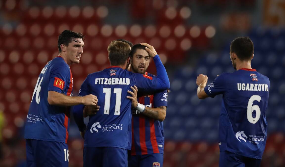 PARTING GIFT: The jets celebrate Nick Fitzgerald's goal in the 2-1 win over Melbourne City on Monday night. The A-League has been suspended until at least April 22. Picture: Sproule Sports Focus