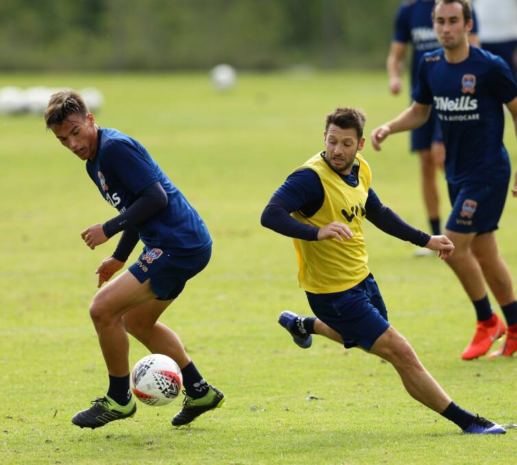 VERSATILE: Pat Langlois and new arrival Wes Hoolahan compete for possession at Jets training. Both are expected to start in a friendly against Hamilton Olympic at Darling St Oval on Thursday night. Picture: Jonathan Carroll