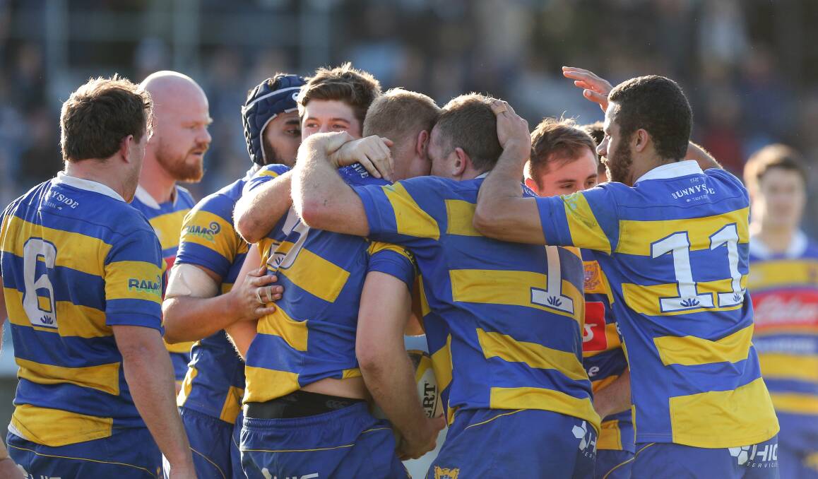 CHAMPIONS: Hamilton players celebrate after scoring a try in their win over Wanderers in the grand final last year. Picture: Max Mason-Hubers