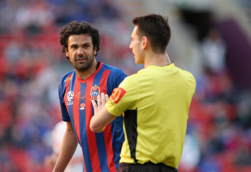 LEADER: Nikolai Topor-Stanley makes a point to referee Jonathan Barreiro. Picture: Getty Images. 