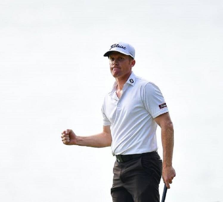 CHAMPION: Andrew Dodt pumps his fist after draining a birdie putt on the first play-off hole to win the Sarawak Championships in Malaysia. Picture: Asian Tour
