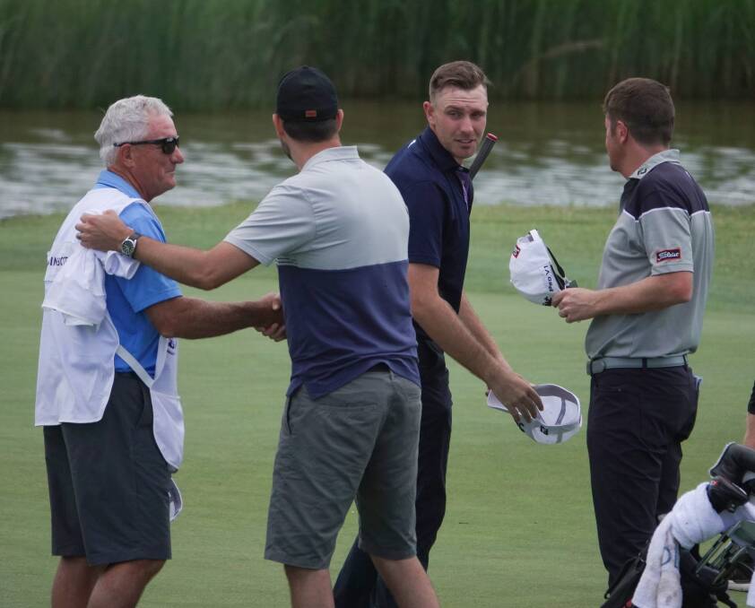 STRONG START: Jake Higginbottom shakes hands with his playing group after posting a five-under 67 in the first round of the NSW Open at Twin Creeks golf Course on Thursday. Picture: David Tease (Golf NSW)