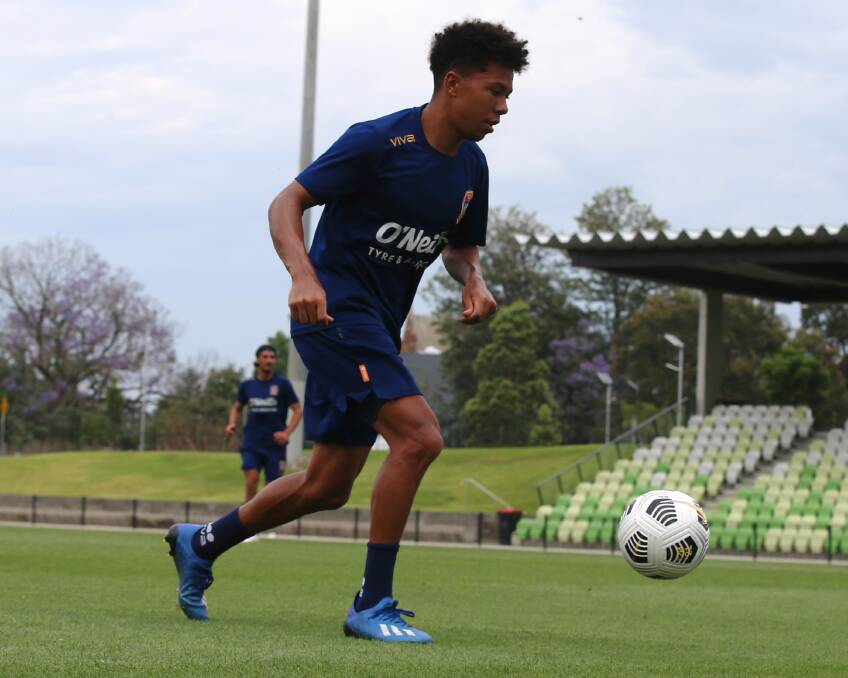 ON THE BALL: Antonee Burke at Jets training. The 23-year-old has returned after three seasons in the US and hopes to secure an A-League contract. Picture: Sproule Sports Focus