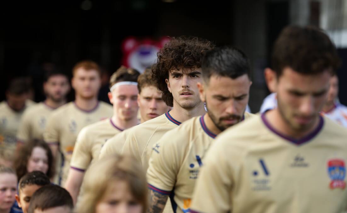 Newcastle Jets file out onto the ground to take on Perth Glory last Saturday. Picture by Jonathan Carroll