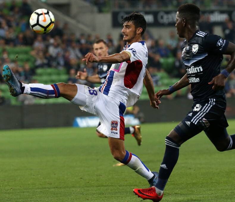 STRETCHED: Johnny Koutroumbis is in doubt for the clash against Sydney after landing heavily on his hip in the 2-1 loss to Melbourne Victory. Picture: AAP Images
