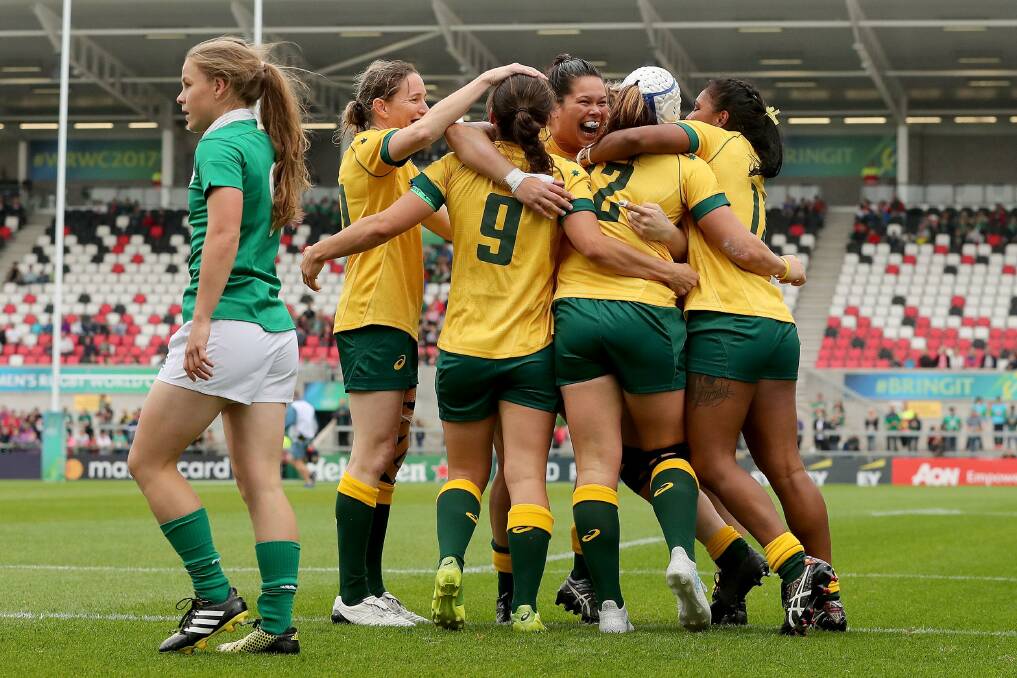 PARTY TIME: The Wallaroos celebrate scoring a try against Ireland at the 2017 World Cup. Picture: AP