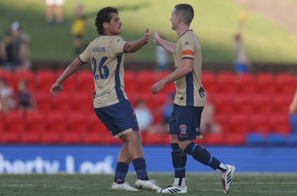Archie Goodwin is congratulated by Brandon O'Neill after the teenager scored in the Jets' 2-all draw with Macarthur. Picture Getty Images