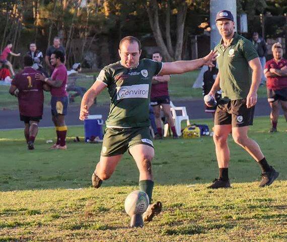 TOE-POKER: Merewether hooker Bill Dunn slots over a conversion to ice the Greens' 19-15 win over Lake Macquarie. Picture: @Matthew Mockovic