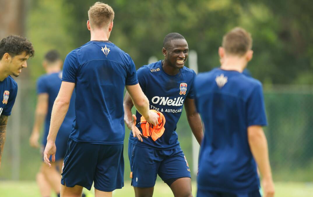 ALL SMILES: Abdiel Arroyo at Jets training on Friday. The Panamanian striker has been taking English lessons and is becoming more accustomed to life in Newcastle and the A-League. Pictures: Jonathan Carroll