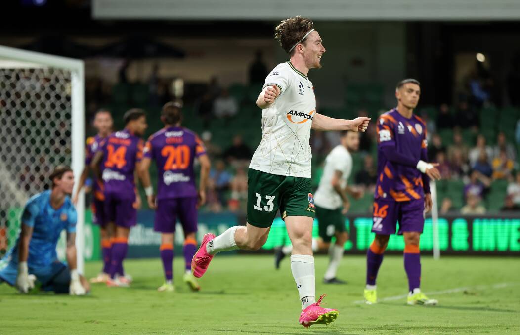 Clayton Taylor celebrates after scoring the Newcastle Jets first goal in a 2-all draw with Perth at HBF Park on Saturday night. Picture Getty Images