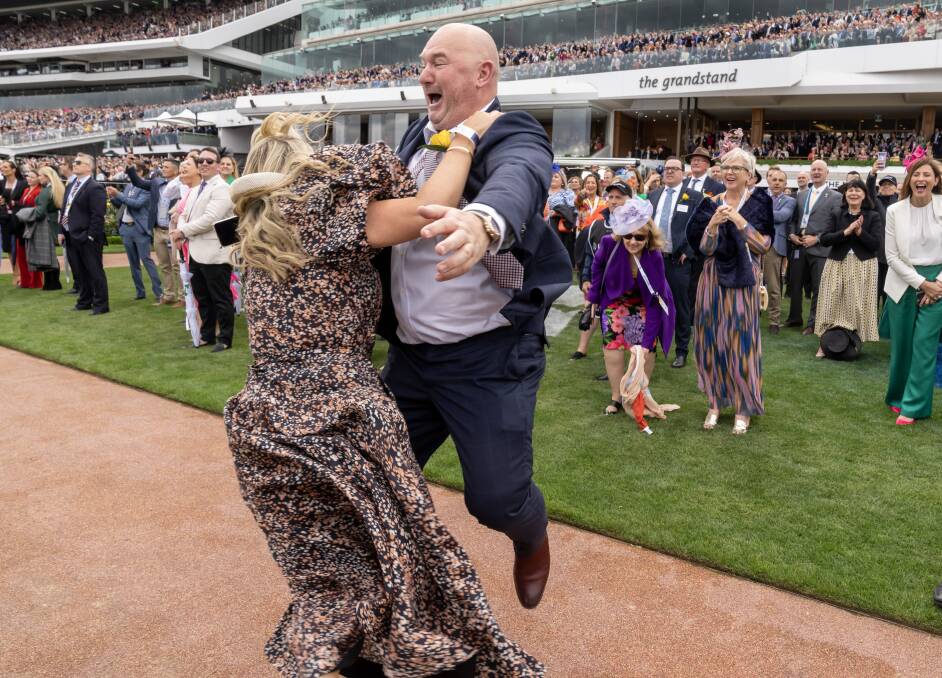 Part-owner Todd Buckingham and his sister Nicole Green celebrate after Gold Trip won the $8 million Melbourne Cup on Tuesday. Picture Getty Images