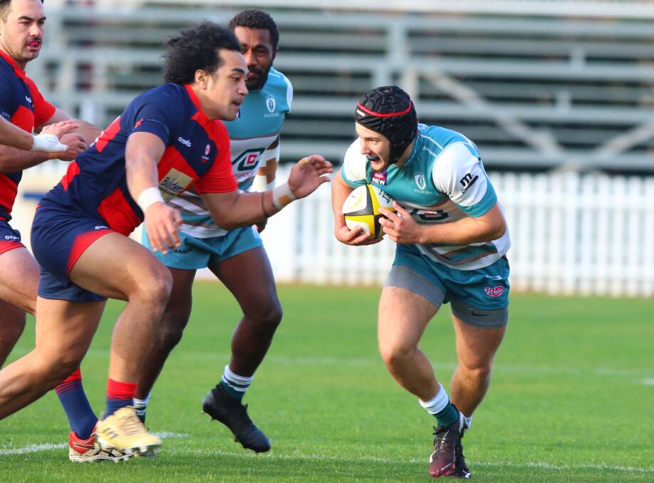 NEW EXPERIENCE: Hunter winger Jonah Winstrand takes on the Illawarra defence. Winstrand was among a host of debutants in the Hunter side at the Country Championships. Picture: Josh Brightman (Balanced Image Studio)