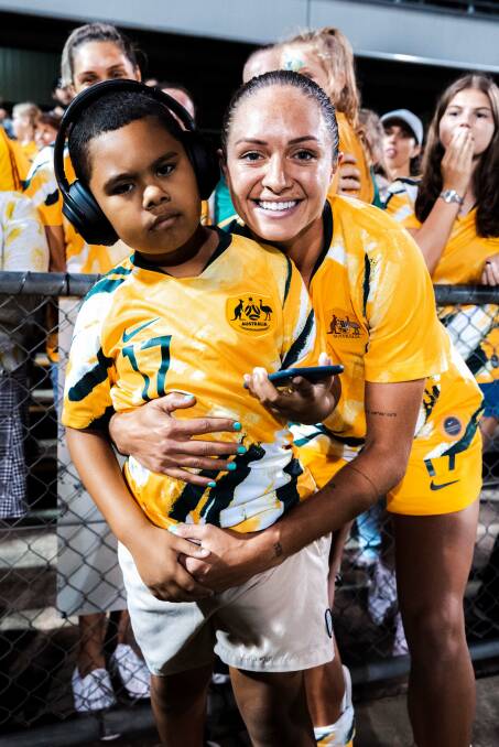 NO.1 FAN: Matildas star Kyah Simon with her eight-year-old nephew Trey.