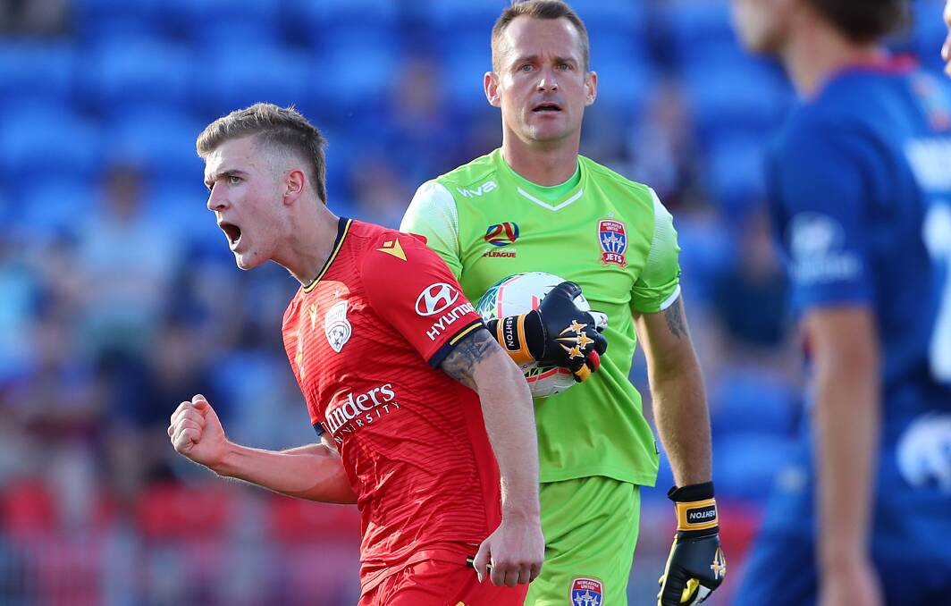 ON TARGET: Riley McGree celebrates after putting Adelaide back on level terms. Picture: Getty Images