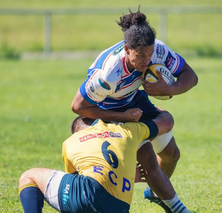 Breakaway Chlayton Frans hits the ball up in the Hunter Wildfires' 48-25 trial win against Bond University. The former Auckland Blues under-20 representative will make his Shute Shield debut on Saturday. Picture by Stewart Hazell