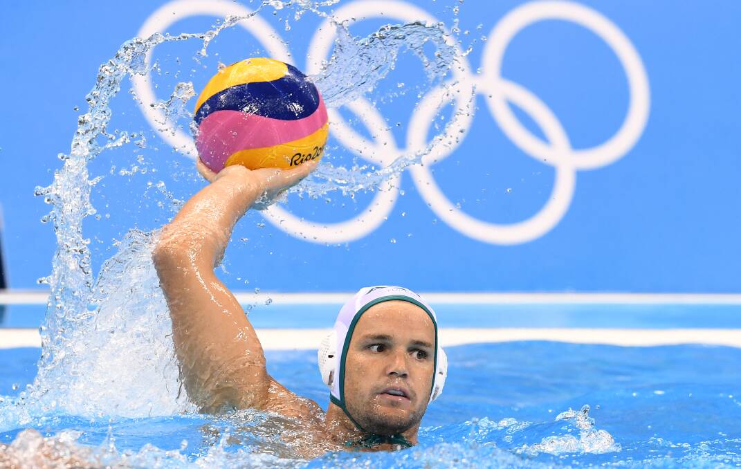 ON TARGET: Merewether water polo player Richie Campbell finished his Olympic career with a win over Kazakhstan. Picture: AAP