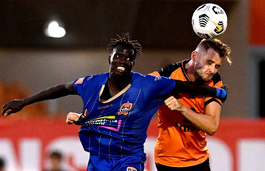 TOUGH: Jets striker Valentino Yuel battles for possession in the scoreless draw with Brisbane at Dolphin Stadium on Sunday night. Picture: Getty Images