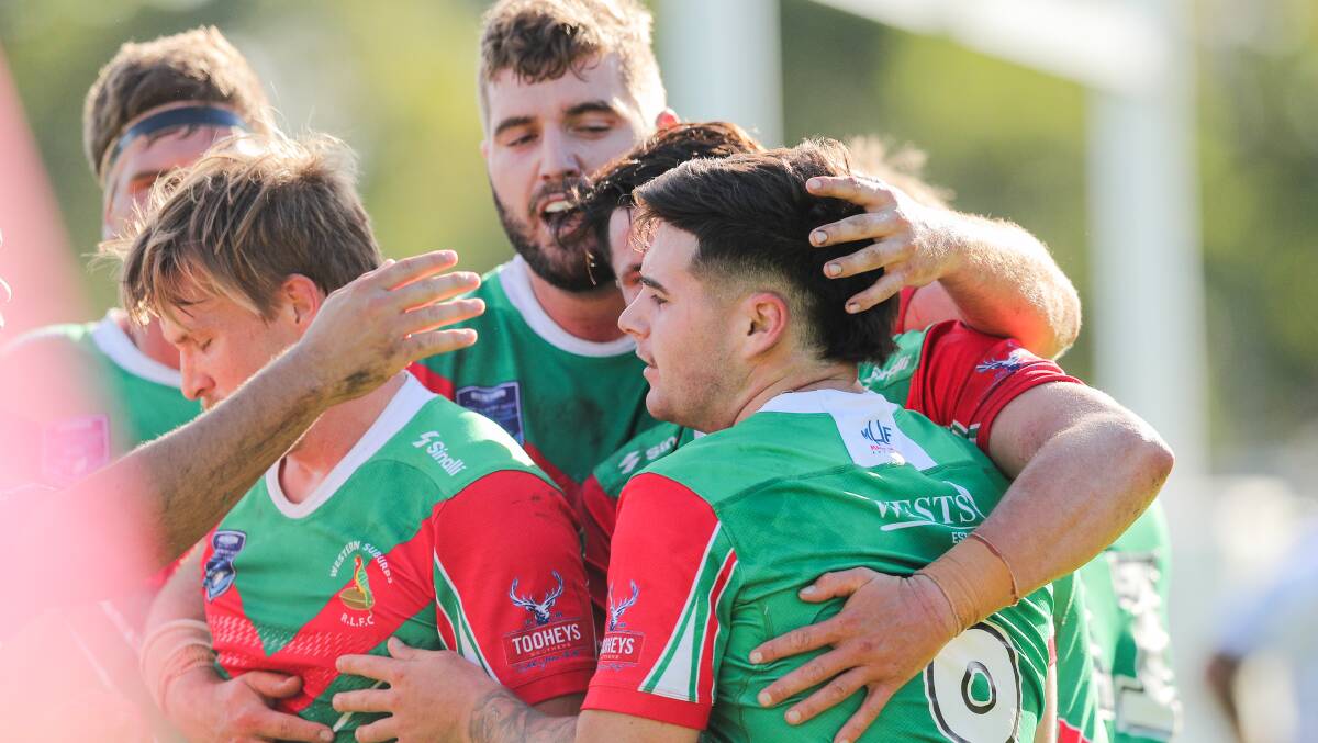 WINNING WAYS: Wests players celebrate a try. Picture: Max Mason-Hubers