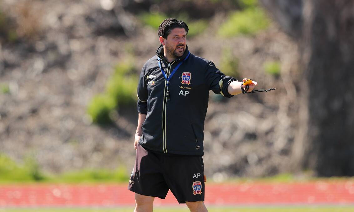 Newcastle Jets coach Arthur Papas gives instructions at training in Maitland this week. Papas has high hopes for the 2022-23 season. Picture by Marina Neil