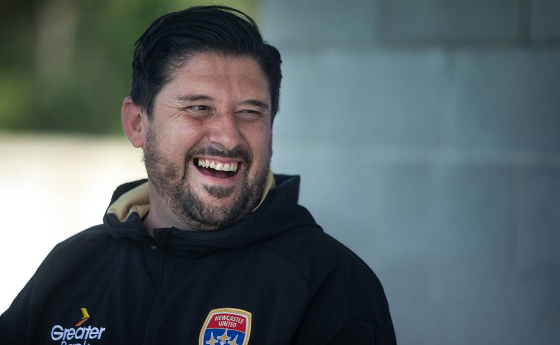 ALL SMILES: Jets coach Arthur Papas at training on Frday. Picture: Marina Neil